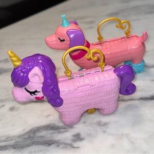Polly Pocket Puppy Party Piñata & Unicorn Travel Toy Exteriors.